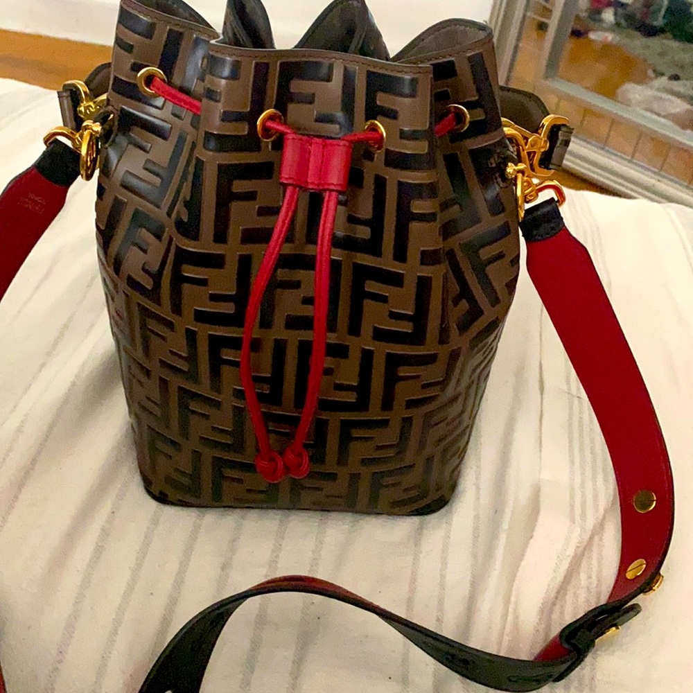 Fendi bucket bag. And short Fendi strap